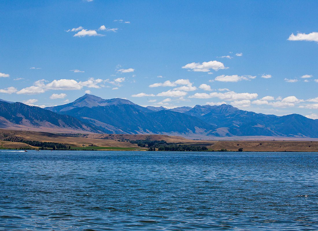 Ennis, MT - Aerial View of Lake Ennis With Mountain Ranges in the Background